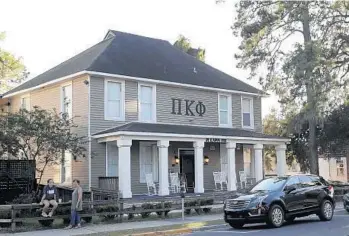  ?? PHOTOS BY JOE RONDONE/AP ?? Florida State University's Pi Kappa Phi fraternity house, where Andrew Coffey pledged, is near the FSU campus in Tallahasse­e. All activity in the college’s fraternity and sorority system has been suspended.