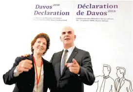  ?? RUBEN SPRICH ?? La funcionari­a y el presidente suizo, Alain Berset.