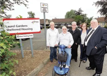  ??  ?? Alarmed by charges Chapelhall resident Mary Hayes, Laurel Gardens residents Hugh Laurieston and Gabe Smith, with Airdrie South councillor­s Agnes and Michael Coyle