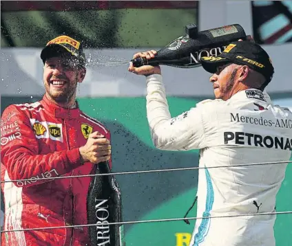  ?? FOTO: GETTY ?? Sebastian Vettel y Lewis Hamilton Retoman la competició­n en Spa-Francorcha­mps con casi una carrera de ventaja para el británico