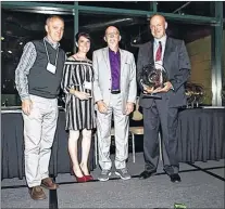  ?? SUBMITTED PHOTO ?? Fry Family Foundation honourees Bob Dawson and Enid Pendergast of the Froude Avenue Community Centre receive their awards from Paul Burt (right) and Darryl Fry (centre right).