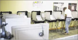  ?? PHIL SKINNER / AJC ?? Thousands of voting machines from the 6th Congressio­nal District special election are currently off-limits for future use pending a lawsuit.