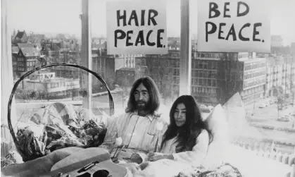  ?? Photograph: Keystone/Getty Images ?? John Lennon and Yoko Ono staged a ‘bed-in’ protest in a hotel in 1969. An archive of materials from the protest will be sold in late September.