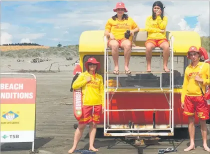  ??  ?? Members of the Waitarere Beach Surf Lifesaving Club, out on patrol for the first time this summer last weekend. (from left) Ann-Marie Montague, Jim Aungiers (standing) and Katie Kerins and Francesca Laney (sitting).