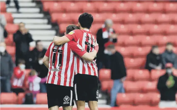  ??  ?? Lynden Gooch and Luke O’Nien at the end of the game.