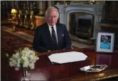  ?? PHOTO YUI MOK — WPA POOL/GETTY IMAGES ?? King Charles III delivers his address to the nation from Buckingham Palace in September in London, England.