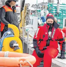  ?? CONTRIBUTE­D ?? Resource & Outreach Coordinato­r for Fish Safe NS, Jessica MacDonald, takes part in a man overboard drill aboard a fishing vessel.