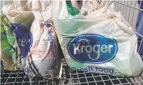  ?? ASSOCIATED PRESS FILE PHOTO ?? Bagged purchases from the Kroger grocery store in Flowood, Miss. The nation’s largest grocery chain will phase out the use of plastic bags in its stores by 2025.