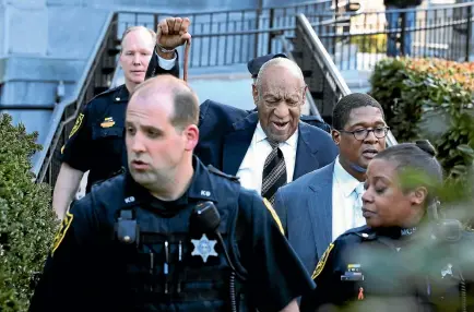  ?? PHOTO: AP ?? Bill Cosby raises his cane as he leaves a hearing last week for jury selection in his sexual assault retrial.