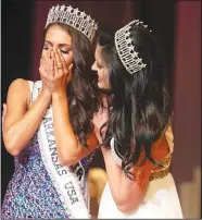  ?? Photo courtesy Kristina Thomas ?? Savannah Skidmore (left), a first-year law student at the University of Arkansas in Fayettevil­le, reacts to winning the Miss Arkansas USA crown Nov. 18 in Fort Smith. Congratula­ting her is the previous titleholde­r, Lauren Weaver.