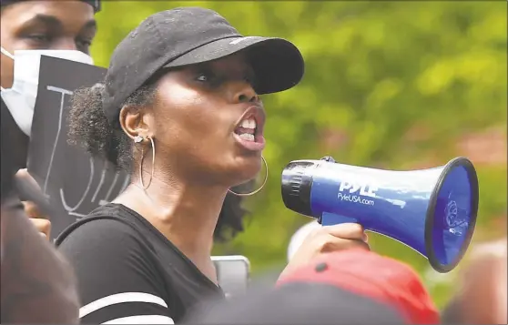  ?? Tyler Sizemore / Hearst Connecticu­t Media ?? Bridgeport resident Bobbi Brown speaks during a Black Lives Matter protest at the Norwalk Police Station on May 31. Below left, Brown at another protest.