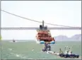  ?? AFP ?? The Ocean Cleanup’s System 001 is towed out of San Francisco Bay on Saturday.