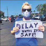  ?? Kimberly Claytor Newport-Mesa Federation of Teachers ?? THE PROTEST in Costa Mesa, above, ref lects a survey that said teachers fear contractin­g the virus and that districts are rushing in-person classes.