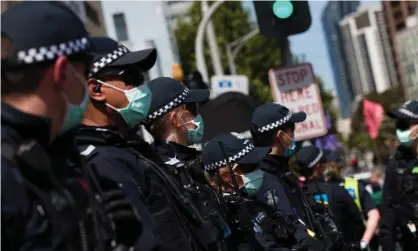  ?? Dave Hewison/Speed Media/REX/Shuttersto­ck ?? Police at a climate protest in Melbourne in December 2020. ‘Australian­s do not enjoy a universal right to protest, protected by law, even though our history is littered with popular movements and disruptive protests that have helped to create modern Australia.’ Photograph: