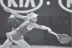  ??  ?? Denmark’s Caroline Wozniacki hits a return against Belgium’s Elise Mertens during their women’s singles semi-finals match on day 11 of the Australian Open tennis tournament in Melbourne. - AFP photo