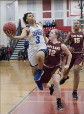  ?? JOHN BLAINE — FOR THE TRENTONIAN ?? Trenton Catholic’s Maniya Custis (2) shoots as Gloucester Catholic’s Ella Vandine (12) defends during the Non-Public B South final at Jackson Liberty on Wednesday night.