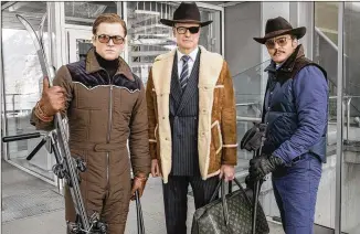  ?? GILES KEYTE / ASSOCIATED PRESS ?? Taron Egerton (from left), Colin Firth, and Pedro Pascal star in “Kingsman: The Golden Circle.”