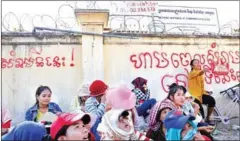  ?? PHA LINA ?? Workers protest at the capital’s Benoh Apparel factory last month after returning from a work suspension to find the factory shuttered and the owners gone.