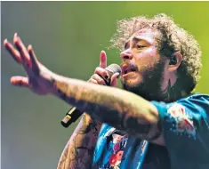  ??  ?? Growling: Austin Richard Post, who performs as Post Malone, at the O2 Arena, London