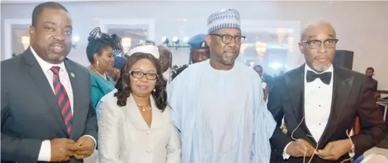  ?? Pic by Pius Okeosis ?? L-R: Gboyega Soyannwo, deputy chief of staff, representi­ng the governor of Lagos State ; Mary Uduk, Ag, DG, Security and Exchange Commission (SEC), representi­ng the vice president ; Abubakar Sani Bello, governor, Niger State, and Chuka Eseka, president, Associatio­n of Issuing Houses of Nigeria, at the 2nd annual dinner and awards night of the associatio­n in Lagos.