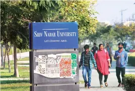  ??  ?? > ( Top) An outdoor study session at Ashoka University; ( above) Shiv Nadar University is spread across 286 acres