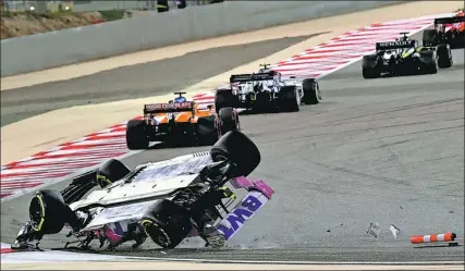  ?? AP ?? Lance Stroll’s Racing Point car flips over during Sunday’s Bahrain Grand Prix. The Canadian escaping uninjured from the incident, which occurred after Romain Grosjean’s crash.