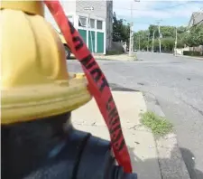  ?? JiM MicHAuD / Boston HerAlD ?? VIOLENT STREETS: A man was killed in a shooting overnight on Sunday on Erie Street in the city.