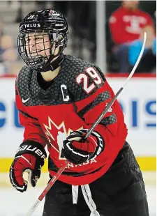  ?? BRUCE KLUCKHOHN THE ASSOCIATED PRESS FILE PHOTO ?? A women’s world under-18 championsh­ip was added to the IIHF calendar in 2008 and Canadian captain Marie-Philip Poulin played in the first one in Calgary.