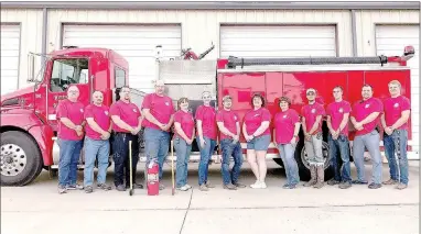  ?? SALLY CARROLL/MCDONALD COUNTY PRESS ?? The Pineville Fire Department crew includes, from left, Fire Chief Gregg Sweeten, Assistant Fire Chief Robert Drake, Captain Ryan Drake, Lt. Travis Bell, Becky Ernest, Kalee Sweeten, Tyler Hayes, RaeLynne Drake, Lori Byrd, Mike Leake, Jake Leake, Steve...