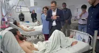  ?? AP ?? the uN’s humanitari­an coordinato­r for afghanista­n, toby lanzer, visits victims of the recent violence at a hospital in Kabul. —
