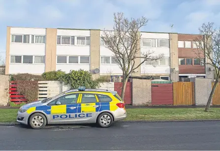  ??  ?? Police at the scene of the investigat­ion in Elgin Drive, Glenrothes.