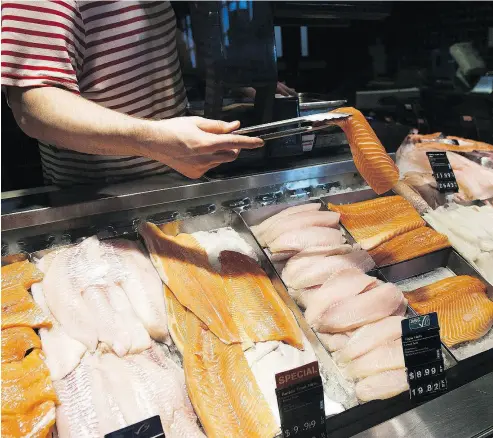  ?? NATHAN DENETTE / THE CANADIAN PRESS ?? A new study suggests some 44 per cent of seafood sold in Canadian grocery stores and restaurant­s is mislabelle­d.