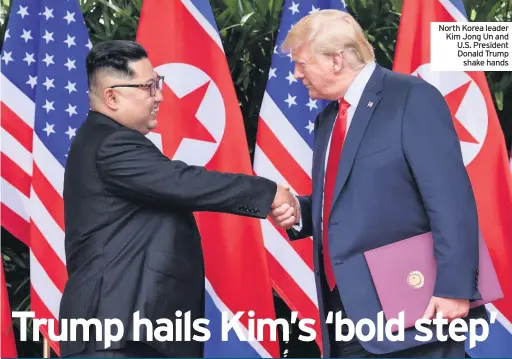  ??  ?? North Korea leader Kim Jong Un and U.S. President Donald Trump shake hands