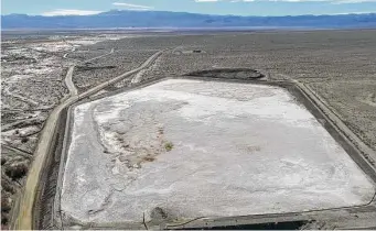  ?? Staff file photo ?? A lithium mine in Silver Peak, Nev., is shown. Analysts are projecting a big increase in demand for lithium and other minerals in the years to come, and experts say more mines will be needed.