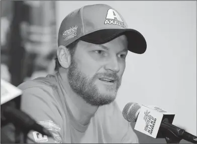  ?? Associated Press ?? Final race: Dale Earnhardt Jr. speaks with the media before Sunday's NASCAR Cup Series auto race at Homestead-Miami Speedway on Friday in Homestead, Fla. Earnhardt is at peace with his decision to retire as he straps into the No. 88 Chevrolet for the final time in his NASCAR Cup career on Sunday. The 43-old Earnhardt has Homestead-Miami Speedway stamped as the final spot in his farewell tour.