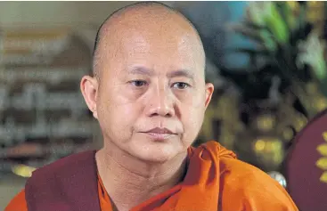  ??  ?? Ultra-nationalis­t monk Ashin Wirathu prepares to give a sermon at a monastery in Yangon following the end of a year-long ban on public speaking earlier this month.