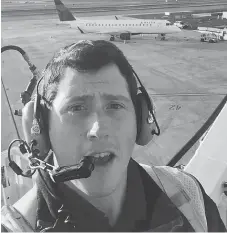  ?? SOCIAL MEDIA / AFP ?? This undated selfie available on social media on Aug. 11 shows airport ground crew worker Richard Russell at work.