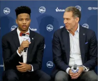  ?? MATT SLOCUM — THE ASSOCIATED PRESS ?? Now that Sixers president Bryan Colangelo, right, has landed yet another top draft pick in Markelle Fultz, the time has come for the perennial strugglers to turn the corner toward the playoffs.