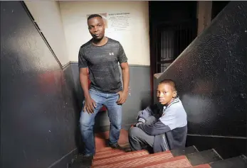  ?? PICTURE: MATTHEWS BALOYI/AFRICAN NEWS AGENCY (ANA) ?? Morris Mdlongwa, 14, with his dad Tendai Kiwa at their home in Johannesbu­rg. Morris suffers from leukaemia and is recovering at home under his father’s care.