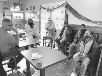  ?? TED SLOWIK/DAILY SOUTHTOWN ?? Sean Howard, from left, Lynn Hudson-Brown, Ron Brown, Jeff Williams, Joe Brooks and Annette Smith discuss the hardships of owning bars and clubs in Harvey during a meeting Friday at Sugababyyy’s Sports Bar & Grill, 15414 Park Ave.