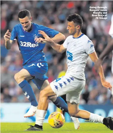  ??  ?? Going through: Rangers’ Jamie Murphy and Rron Broja of
FK Shkupi