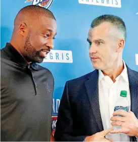  ?? [PHOTO BY JIM BECKEL, THE OKLAHOMAN] ?? Billy Donovan, right, has spent considerab­le time this summer studying up on new Thunder additions, including Raymond Felton.