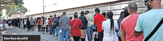  ?? | DOCTOR NGCOBO African News Agency (ANA) ?? HUNDREDS of health-care workers queued for several hours outside St Augustine’s Hospital in Durban yesterday waiting to get the Covid-19 vaccine. As the Sisonke study, under which health-care workers are being vaccinated, comes to an end on Saturday, there has been a surge in people wanting to get the vaccine.