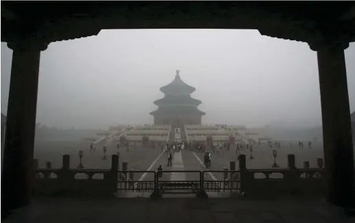  ??  ?? VISITORS TO the Temple of Heaven in Beijing, China. Israel’s relations with China and Asia are more complex and foggy than they appear.