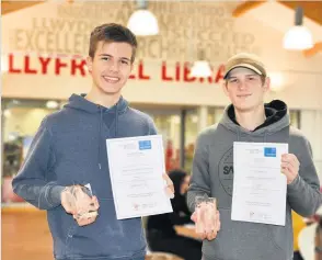  ??  ?? Coleg Sir Gâr students Kieran Davies (left) and Dan Roberts who both won silver awards at a Skillls Competitio­n Wales final.