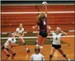  ?? RANDY MEYERS — THE MORNING JOURNAL ?? Rocky River junior Ava Rauser goes up high for a kill against Elyria Catholic on Aug. 29.