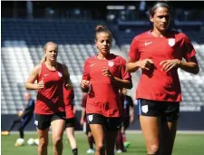  ?? Denver Post File ?? EQUAL PAY? Mallory Pugh warms up during USWNT training in 2017.