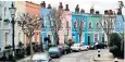  ??  ?? Colourful houses in Kelly St, Kentish Town in London enjoy a 15 per cent premium