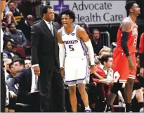  ?? Tribune News Service ?? Sacramento Kings’ guard De’aaron Fox reacts after making a 3-pointer against the Bulls in the second half of Monday night’s game in Chicago. Fox scored 25 points as the Kings won 108-89.