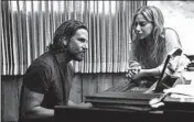  ?? WARNER BROS. ?? Bradley Cooper, left, and Lady Gaga play the central couple in the latest remake of “A Star is Born.”